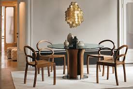 Rustic furniture goes well with a farmhouse design, while industrial designs add modern chic to an older dining room. Amazing Contemporary Dining Tables Steal The Show With A Sculptural Base