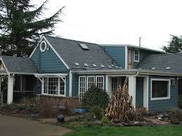 To choose the color of roofing shingles, go with a color that pairs well with the color of your house. Estate Gray Shingles Blue House House Paint Exterior Exterior House Colors House Exterior