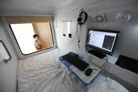 People In A Pod Capsule Hotel Opens In China Capsule Hotel