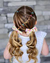 Just begin braiding from top of the head and tie the pony with the hair knot itself at the end. Maddie Ziegler S Parted Half Ponytail Is The Easiest And Cutest Back To School Hairstyle Hair Styles Little Girl Hairstyles Girls Hairstyles Easy
