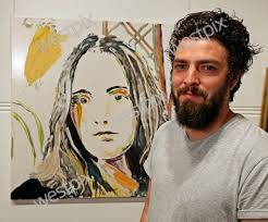 Iain Dean with his portrait of Pilar Mata