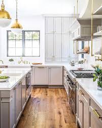 Light Grey Cabinets Looking So Elegant And Classic With The Gold Hardwares What Do You Think Of Grey Cabinet Home Kitchens Kitchen Design Kitchen Inspirations