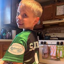 ⚾️ How cute is Braden modeling his new @nh_mvybs baseball jersey sponsored  by Saucier Scapes and The Merrimack!?!? Go green! #themerrimack  #communitybanking #banklocallynh #merrimackvalley