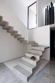U Shaped Concrete Staircase Casa Garcias By Warm Architects Up Interiors Concrete Staircase Staircase Design Modern Staircase