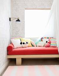 Simply pull out the trundle bed neatly stored under the daybed's mattress and support and you have another bed ready to go. A Custom Daybed Story Shop Decor Emily Henderson