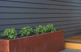 Featuring a deep brown/orange finish and a modern rectangular design, the corten steel planter box is ideal as a patio accent or as a garden focal point. Custom Made Corten Steel Garden Edging And Planters Incision Nz