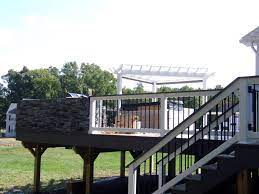 Want A Eye Catching Home Addition Love The Wow Factor Stone Walls Are A Beautiful Addition To Your New Deck They Enhance Curb App Deck Cost Deck Diy Deck