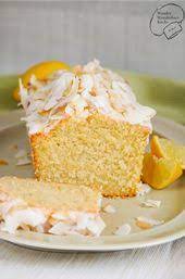 saftiger kokos zitronen kuchen aus der kastenform mit zitronenguss kokosmilch und kokosflocken seh backen mit kokosmehl kuchen mit kokosmilch zitronen kuchen