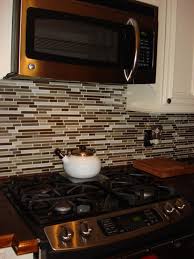 Glass Tile Backsplash All The Way Up Under The Microwave Kitchen Inspiration Design Kitchen Crashers Kitchen Colors