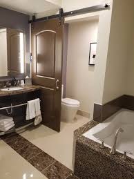 In this video i go into more detail on installing a barn door using relatively inexpensive hardware and materials. Master Bathroom Note Barn Door For Toilet Picture Of Oxford Suites Sonoma County Rohnert Park Tripadvisor