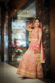 A Coral Pink Lehenga With A Gold Finish By Bombay Selections Rajouri Garden Delhi Ncr For Bride Rhythmpreet Kau Indian Bride Dresses Desi Bride Indian Wedding