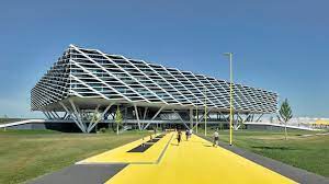 Adidas laces, herzogenaurach, germany the new laces blends into the existing world of sports ensemble as a floating counterpart to the black, recumbent mass of the adidas brand center. Adidas Disguises Office Block As World Of Sports Arena