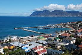 Kalk Bay Is One Of The Last Fishing Villages In The Cape Perched On A Rocky Shelf Between Mountain And Deep Blue Sea And Seaside Towns Top 10 Beaches Kalk Bay