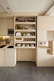 Compact ironing board with a folding mechanism, which can be fixed in any corner or railing with a few small containers pinned over the kitchen sink is a great idea for storing washed vegetables, fruits, detergents and other small things. Everything Plus The Kitchen Sink Small Kitchen Ideas From Compact Design To Clever Storage You Magazine