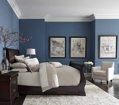 This soft shade of blue helps your space feel a bit more expansive. Navy Blue Bedroom With Dark Furniture Trendecors