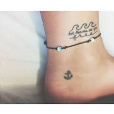 Photo by jason travis photo by: Ankle Tattoo Saying Let The Sea Set You Free Together