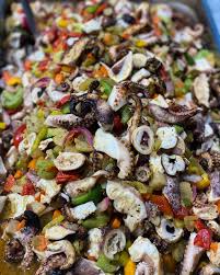 Our homemade octopus salad 😍 this is tenderized octopus marinated with a  special blend of oils, herbs, spices, and vegetables. It is a great  solution for lunch or to add to a