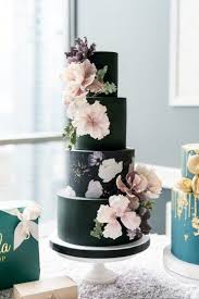 black wedding cake with hand painted flowers and sugar flowers vanilla bake shop wedding cakes with flowers modern wedding cake cool wedding cakes black wedding cake with hand painted
