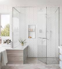 From bathroom design to room addition and more, we will work with you every step of the way to design and build the home you've envisioned for your family. Master Bath Inspiration Herringbone Pattern On The Wall And The Glass Surround Is Beautiful Wi Modern Bathroom Design Bathroom Interior Design Bathroom Design