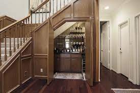 Wet Bar Is Tucked In Under The Staircase And Includes A Wine Cooler Home Bar Designs Home Bar Decor Bar Design