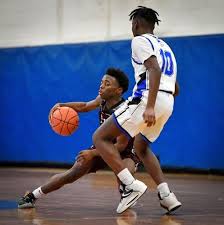 Faith Christian boys basketball team defeats top seed Phil-Mont