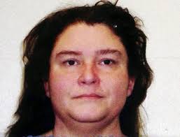 Stow woman charged in slaying of Michelle Johnson