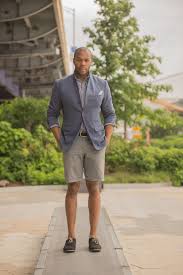 Men S Grey Blazer White And Black Gingham Long Sleeve Shirt Beige Shorts Black Suede Derby Shoes Mens Outfits Mens Casual Outfits Grey Blazer
