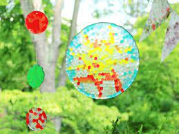 How do you string ribbon through a suncatcher? How To Make Melted Bead Suncatchers With Plastic Pony Beads Video
