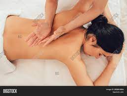 Beautiful woman relaxing with back massage at spa salon. Relaxing Back Massage Image Photo Free Trial Bigstock