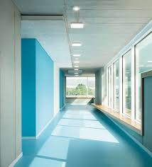 Great Use Of Color Blocking In Interior Paint Schemes Secondary School Ergolding By Behnisch School Interior Commercial Interior Design Interior Design News