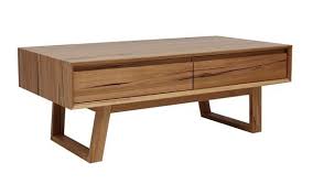 The legs and table skirt are salvaged hand hume. Wormy Chestnut Timber Coffee Table Australian Made Ausfurniture