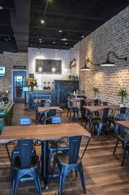 Brick Walls And Subway Tile Complete The Classic Look In This Coffee Shop Coffeeshop Cafed Coffee Shop Decor Cafe Interior Design Restaurant Interior Design