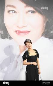 Actress kara wai poses