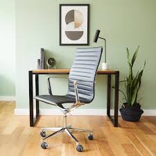 It has a luxurious, upholstered black faux leather and a calypso desk chair. Cult Living Black And Gold Ribbed Office Chair With High Back Cult