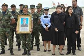 Ku nan, who is the former federal territories minister, has another rm2 million corruption case pending before a separate kuala lumpur high court, scheduled to be heard on monday, 21 december. An Honor Guard Holds Up A Picture Of Samarn Kunan 38 A Diver Who Died Working To Save 12 Boys And Their Soccer Coach Inside A Flooded Cave As Family Members Mourn