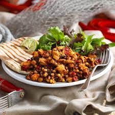 Chunked atlantic salmon with vegetables, giant couscous and lentils in a spicy harissa style dressing. Salmon With Giant Couscous Lentils Harissa Spices John West Uk