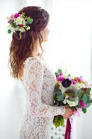 Maybe you would like to learn more about one of these? Joyful Girl Bride In A White Knitted Dress Posing With A Bouquet Of Flowers 2375847 Stock Photo At Vecteezy