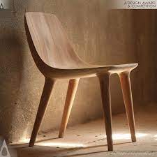 The contoured seat design provides maximum comfort, inviting you to put your feet up. Darya Chair Design Wood Chair Design Chair Design Wooden Furniture