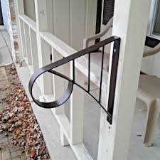 Here is a great solution to add a handrail to your steps. Wrought Iron Metal 1 2 Step Handrail Stair Safety Steel Grab Rail Post Mount Step Railing Handrail Outdoor Handrail