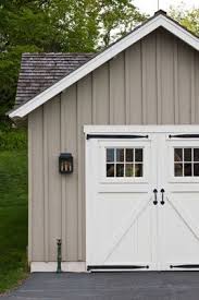 Definitely not cheap but the smell and long lasting qualities of the cedar siding make it worthy of a look for some people who have their mind set on a cedar garage. Pin By Debbie Reine On Outdoor Shed House Siding House Exterior Exterior Siding