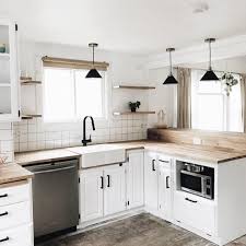 Black And White Kitchen With Wood Countertops Loving These Wood Countertops And Vigoindustries Matte Black Faucet From Sarahshireed Link In Bio Kitchen Remodel Small Home Renovation Home Remodeling