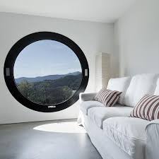 The blanket 'architectural' term for circular windows is rose window. Unique And Compelling Round Windows For Every Room
