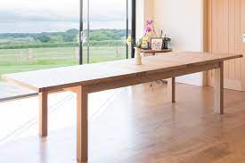 The dining table extenders are made from strong materials that are highly durable to give you long lifespans. Large 12 14 Seater Oak Extending Dining Table Tallinn Free Delivery Top Furniture
