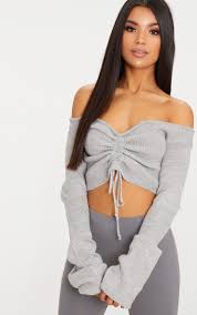 Knitted tops for women come in multiple silhouettes. Grey Ruched Knit Extreme Sleeve Crop Sweater Prettylittlething Il