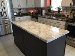 The existing countertops were an old formica surface and it had held up pretty well and i had enjoyed it but i really did want to replace it with a lighter color so there was no other a. Self Adhesive Peel And Stick Riviera White Camel Marble Countertop Update Ezfaux Decor Llc