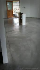 The Main Level Of This Unique Round Home Has Been Sealed Burnished Provided A Similar Look To Polished Conc Smooth Concrete Flooring Concrete Stained Floors