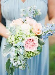 A gorgeous north carolina wedding with beautiful pops of purple and gold. Loose Pastel Bridesmaid Bouquet Wedding Bouquets Pink Blue Wedding Bouquet Blue Wedding Flowers