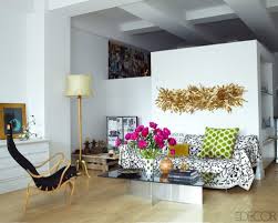 The variety of patterns and colors completes the eclectic story of this shabby chic living room. Decorating Ideas 12 White Rooms With Pops Of Color