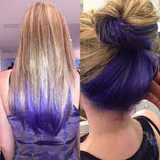 Purple and blue highlighted strands intertwined on your dark brown hair will make you stand out for sure. Color By Nakia Renee Bright Purple Blue Peeks Out Underneath Blonde Highlights Like Dip Dyed Ends Blo Underlights Hair Hair Styles Highlights Underneath Hair