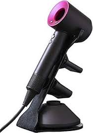 Magnetic attachments can be attached and removed from the stand with one click. 8 Bathroom Ideas Hair Dryer Dyson Hair Dryer Hair Dryer Holder